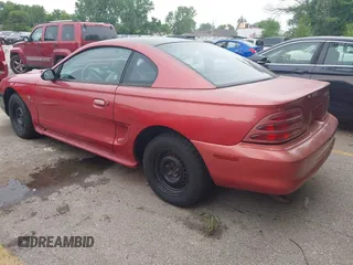 1995 Ford Mustang with VIN 1FALP4040SF177561, listed as a IAAI auction lot 42496075 with 190,409 mi miles and . Bid and sale history available at DreamBid. Image 3.