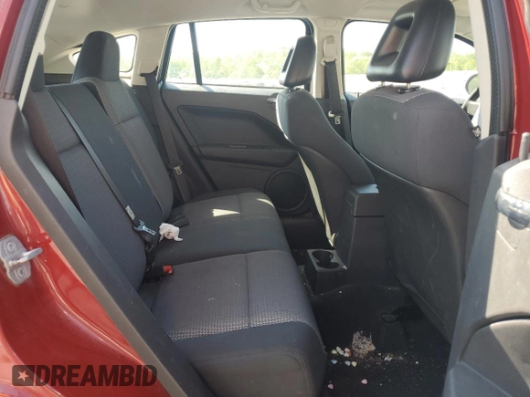 2009 Dodge Caliber SXT with VIN 1B3HB48A29D144304, listed as a Copart auction lot 53119375 with 173,778 mi miles and Salvage Title. Bid and sale history available at DreamBid. Image 11.