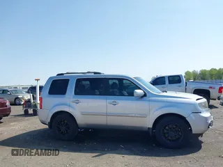 2013 Honda Pilot Touring with VIN 5FNYF3H95DB032438, listed as a IAAI auction lot 41865938 with 298,973 mi miles and . Bid and sale history available at DreamBid. Image 13.
