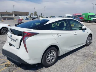 2016 Toyota Prius Four with VIN JTDKARFUXG3511034, listed as a IAAI auction lot 42137394 with 77,424 mi miles. Bid and sale history available at carsss.com. Image 4.