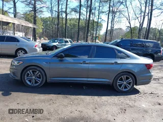 2021 Volkswagen Jetta S z VIN 3VWC57BU7MM018163, wystawiony jako IAAI lot #41661128 z przebiegiem 49 679 mil mil oraz . Historia ofert i sprzedaży dostępna na DreamBid. Obrazek 14.