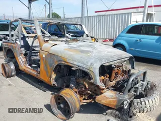 2009 Jeep Wrangler X with VIN 1J4FA24199L759273, listed as a IAAI auction lot 41472498 with Not Provided miles and . Bid and sale history available at DreamBid. Image 1.