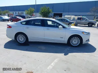 2013 Ford Fusion Energi Titanium with VIN 3FA6P0SU3DR273676, listed as a IAAI auction lot 41777822 with 189,283 mi miles. Bid and sale history available at carsss.com. Image 13.