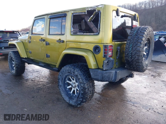 2007 Jeep Wrangler Unlimited Sahara with VIN 1J4GA59187L189519, listed as a IAAI auction lot 41204036 with 165,428 mi miles and . Bid and sale history available at DreamBid. Image 3.
