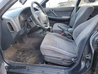 1993 Subaru Legacy L with VIN 4S3BJ6331P7949959, listed as a Copart auction lot 88360485 with 125,562 mi miles and Salvage Title. Bid and sale history available at DreamBid. Image 7.