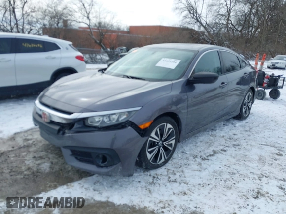 2017 Honda Civic EX-T with VIN 19XFC1E38HE031851, listed as a IAAI auction lot 41625294 with 97,432 mi miles and . Bid and sale history available at DreamBid. Image 19.