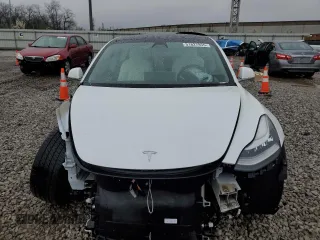 2020 Tesla Model 3 Standard Range Plus z VIN 5YJ3E1EA0LF710043, wystawiony jako Copart lot #51627855 z przebiegiem Nie podano mil oraz Szkoda całkowita • Salvage title. Historia ofert i sprzedaży dostępna na DreamBid. Obrazek 5.