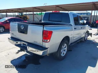 2011 Nissan Titan SV with VIN 1N6BA0EDXBN313156, listed as a IAAI auction lot 41731745 with 219,589 mi miles and . Bid and sale history available at DreamBid. Image 4.