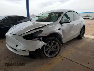 2023 Tesla Model Y Long Range z VIN 7SAYGDEE0PF871733, wystawiony jako Copart lot #56680875 z przebiegiem 23 100 mil mil oraz Szkoda całkowita • Salvage title. Historia ofert i sprzedaży dostępna na DreamBid. Obrazek 1.