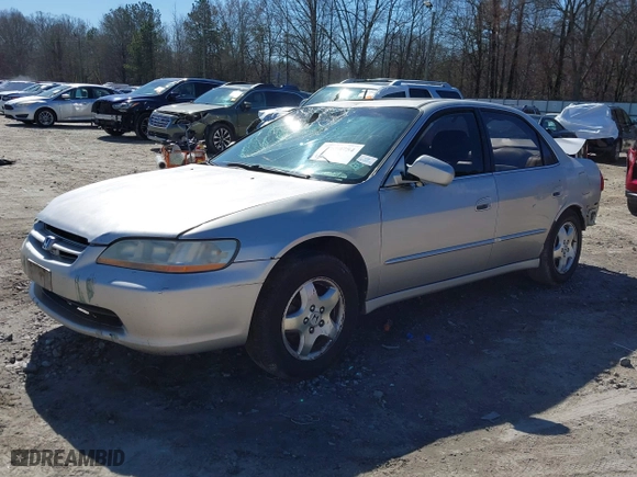 1999 Honda Accord Sdn EX with VIN 1HGCG1658XA005860, listed as a IAAI auction lot 41650754 with 295,446 mi miles. Bid and sale history available at carsss.com. Image 21.