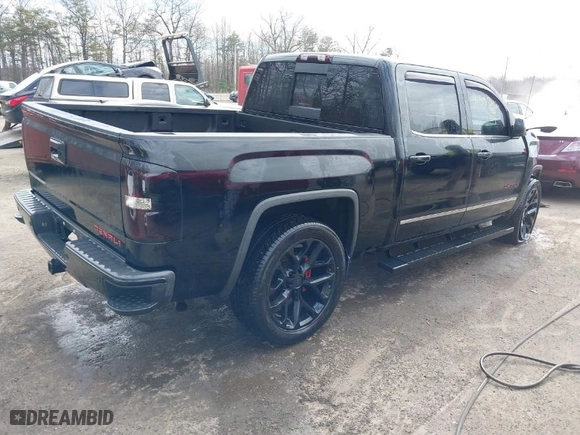 2015 GMC Sierra 1500 Denali with VIN 3GTU2WEC8FG297024, listed as a IAAI auction lot 41653424 with 195,080 mi miles. Bid and sale history available at carsss.com. Image 4.