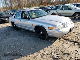 1998 Ford Crown Victoria Police z VIN 2FAFP71W9WX149346, wystawiony jako Copart lot #79121214 z przebiegiem 179 286 mil mil oraz Tytuł czysty. Historia ofert i sprzedaży dostępna na DreamBid. Obrazek 11.
