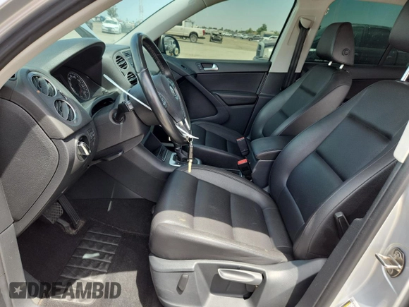 2014 Volkswagen Tiguan SE with VIN WVGAV3AX3EW590861, listed as a Copart auction lot 58517535 with 68,481 mi miles and Salvage title. Bid and sale history available at DreamBid. Image 7.