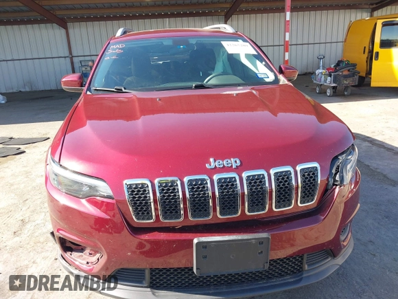 2020 Jeep Cherokee Latitude with VIN 1C4PJLCB4LD648903, listed as a IAAI auction lot 42267209 with 20,133 mi miles and . Bid and sale history available at DreamBid. Image 12.