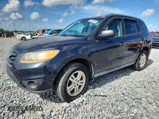 2011 Hyundai Santa Fe GLS z VIN 5XYZG3AB3BG037044, wystawiony jako Copart lot #60634795 z przebiegiem 147 030 mil mil oraz Czysty tytuł • Clean title. Historia ofert i sprzedaży dostępna na DreamBid. Obrazek 1.