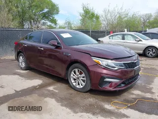 2019 Kia Optima LX with VIN 5XXGT4L39KG277217, listed as a IAAI auction lot 40220142 with 139,755 mi miles. Bid and sale history available at carsss.com. Image 1.
