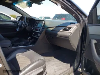 2019 Hyundai Sonata Sport with VIN 5NPE34AF2KH792374, listed as a IAAI auction lot 41987740 with 77,209 mi miles. Bid and sale history available at carsss.com. Image 5.