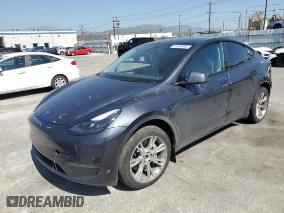 2024 Tesla Model Y Long Range z VIN 7SAYGDEE5RA244641, wystawiony jako Copart lot #51864845 z przebiegiem 23 096 mil mil oraz Szkoda całkowita • Salvage title. Historia ofert i sprzedaży dostępna na DreamBid. Obrazek 1.