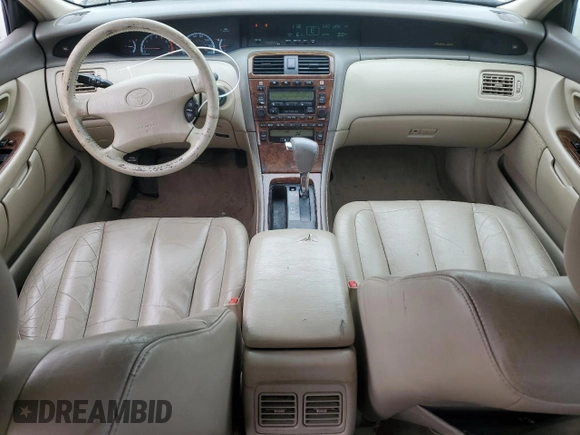 2001 Toyota Avalon XL z VIN 4T1BF28B31U136069, wystawiony jako Copart lot #57355025 z przebiegiem 217 489 mil mil oraz Szkody całkowita. Historia ofert i sprzedaży dostępna na DreamBid. Obrazek 8.