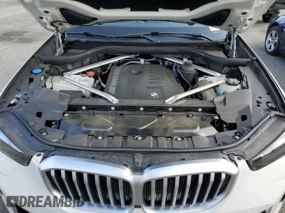 2025 BMW X5 sDrive40i with VIN 5UX13EU0XS9X91850, listed as a Copart auction lot 51511875 with 4,859 mi miles and Salvage Title. Bid and sale history available at carsss.com. Image 12.