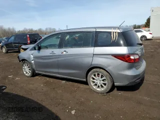 2015 Mazda 5 Touring with VIN JM1CW2CL4F0185773, listed as a Copart auction lot 48615505 with 105,488 mi miles and Salvage Title. Bid and sale history available at carsss.com. Image 2.
