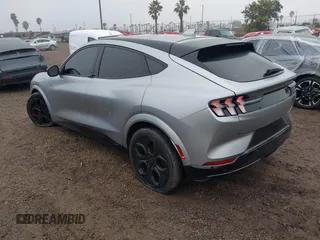 2021 Ford Mustang Mach-E GT z VIN 3FMTK4SE1MME00154, wystawiony jako IAAI lot #41536548 z przebiegiem 19 568 mil mil oraz . Historia ofert i sprzedaży dostępna na DreamBid. Obrazek 3.