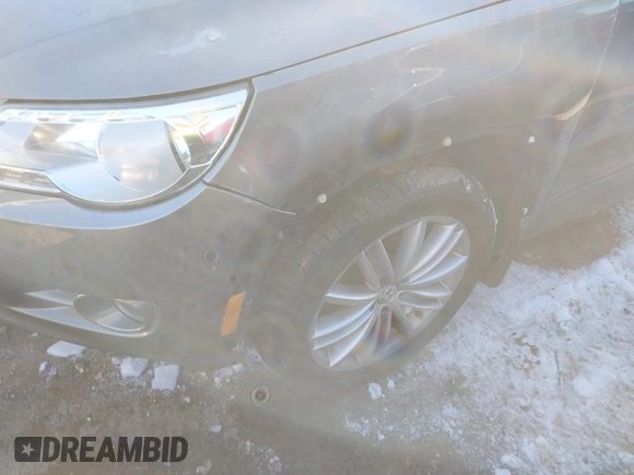 2010 Volkswagen Tiguan SEL with VIN WVGBV7AX0AW000279, listed as a IAAI auction lot 41389452 with 87,258 mi miles and . Bid and sale history available at DreamBid. Image 6.