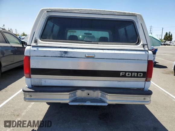 1992 Ford F-150 with VIN 1FTDF15Y7NLA93044, listed as a Copart auction lot 65185644 with 166,919 mi miles and Clean Title. Bid and sale history available at carsss.com. Image 6.