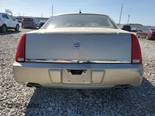 2007 Cadillac DTS V8 z VIN 1G6KD57Y27U121902, wystawiony jako Copart lot #70699164 z przebiegiem 122 156 mil mil oraz Szkoda całkowita • Salvage title. Historia ofert i sprzedaży dostępna na DreamBid. Obrazek 6.