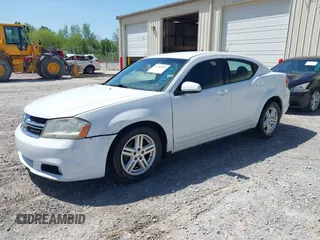 2013 Dodge Avenger SXT with VIN 1C3CDZCB8DN589038, listed as a IAAI auction lot 41985488 with 174,587 mi miles and . Bid and sale history available at DreamBid. Image 2.