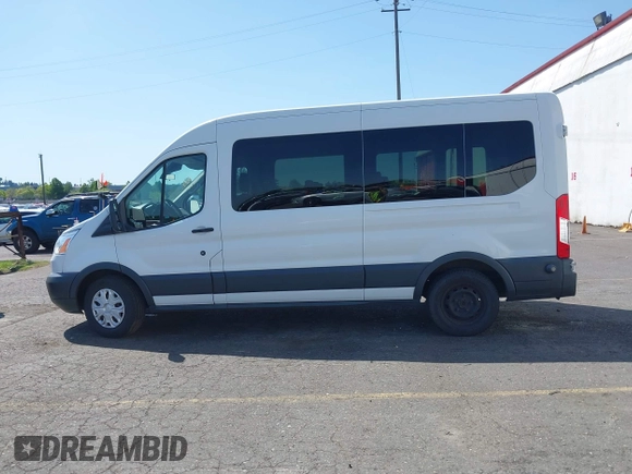 2015 Ford Transit Passenger XL z VIN 1FBAX2CG7FKA75719, wystawiony jako IAAI lot #42135118 z przebiegiem Nie podano mil oraz . Historia ofert i sprzedaży dostępna na DreamBid. Obrazek 14.
