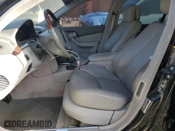 2003 Mercedes-Benz S-Class 5.0L with VIN WDBNG75J13A343070, listed as a Copart auction lot 77412604 with 154,533 mi miles and Salvage Title. Bid and sale history available at carsss.com. Image 7.