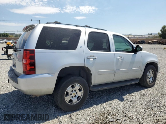 2014 Chevrolet Tahoe LT with VIN 1GNSCBE09ER118630, listed as a Copart auction lot 58906965 with 92,734 mi miles and Salvage title. Bid and sale history available at DreamBid. Image 3.