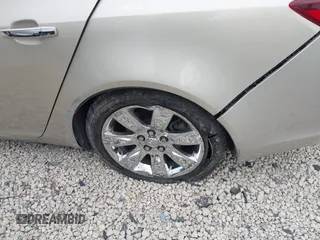 2014 Buick Regal Premium I z VIN 2G4GN5EX4E9323866, wystawiony jako IAAI lot #42072914 z przebiegiem Nie podano mil oraz . Historia ofert i sprzedaży dostępna na DreamBid. Obrazek 17.