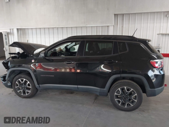 2020 Jeep Compass Trailhawk with VIN 3C4NJDDB3LT170463, listed as a IAAI auction lot 42446080 with 83,336 mi miles and . Bid and sale history available at DreamBid. Image 15.