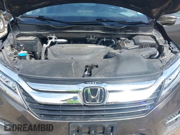2018 Honda Odyssey Elite with VIN 5FNRL6H96JB069458, listed as a IAAI auction lot 41687526 with 41,004 mi miles and . Bid and sale history available at DreamBid. Image 10.