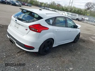 2017 Ford Focus ST with VIN 1FADP3L99HL310186, listed as a IAAI auction lot 41963368 with 93,769 mi miles and . Bid and sale history available at carsss.com. Image 4.