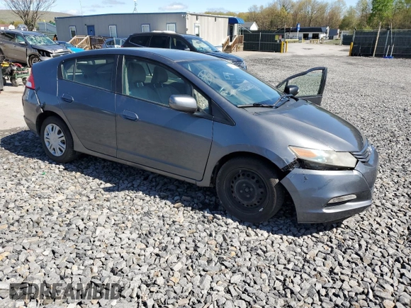 2010 Honda Insight LX z VIN JHMZE2H59AS000085, wystawiony jako Copart lot #54932975 z przebiegiem 218 961 mil mil oraz Szkoda całkowita • Salvage title. Historia ofert i sprzedaży dostępna na DreamBid. Obrazek 4.