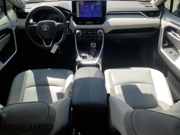 2023 Toyota RAV4 XLE Premium z VIN 2T3A1RFV4PW405924, wystawiony jako Copart lot #51875765 z przebiegiem 3 905 mil mil oraz Szkoda całkowita • Salvage title. Historia ofert i sprzedaży dostępna na DreamBid. Obrazek 8.