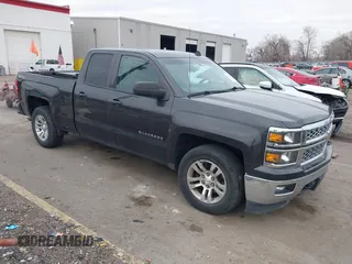 2014 Chevrolet Silverado 1500 LT with VIN 1GCVKREC8EZ325070, listed as a IAAI auction lot 41328199 with 164,009 mi miles and . Bid and sale history available at DreamBid. Image 1.
