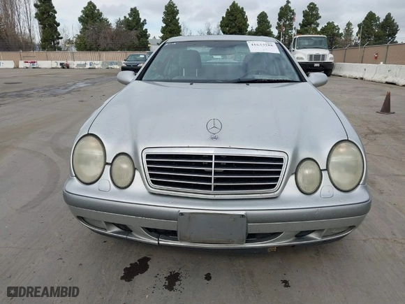 1998 Mercedes-Benz CLK-Class with VIN WDBLJ65G7WF030460, listed as a IAAI auction lot 41633288 with 327,848 mi miles. Bid and sale history available at carsss.com. Image 6.