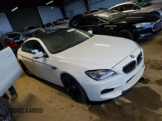 2015 BMW M6 z VIN WBS6C9C59FD467571, wystawiony jako Copart lot #85105724 z przebiegiem 128 295 mil mil oraz Czysty tytuł • Clean title. Historia ofert i sprzedaży dostępna na DreamBid. Obrazek 4.