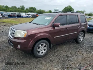2011 Honda Pilot Touring z VIN 5FNYF4H96BB074619, wystawiony jako Copart lot #56681715 z przebiegiem 142 161 mil mil oraz Szkoda całkowita • Salvage title. Historia ofert i sprzedaży dostępna na DreamBid. Obrazek 1.