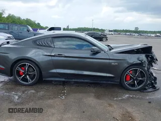2016 Ford Mustang GT z VIN 1FA6P8CF4G5264863, wystawiony jako IAAI lot #42078115 z przebiegiem 95 889 mil mil oraz . Historia ofert i sprzedaży dostępna na DreamBid. Obrazek 13.