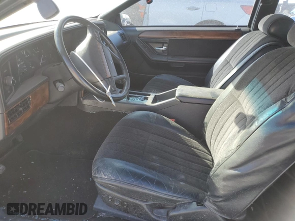 1991 Mercury Cougar z VIN 1MEPM60T2MH600363, wystawiony jako Copart lot #76543714 z przebiegiem 169 767 mil mil oraz Szkoda całkowita • Salvage title. Historia ofert i sprzedaży dostępna na DreamBid. Obrazek 7.