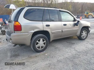 2002 GMC Envoy SLT with VIN 1GKDT13S222118249, listed as a IAAI auction lot 40798021 with 1 mi miles. Bid and sale history available at carsss.com. Image 4.
