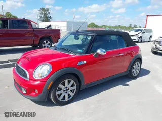 2011 MINI Cooper Convertible s with VIN WMWZP3C55BT249405, listed as a IAAI auction lot 41461640 with 59,856 mi miles. Bid and sale history available at carsss.com. Image 2.