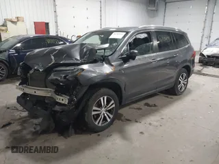 2017 Honda Pilot EX-L with VIN 5FNYF6H51HB080796, listed as a IAAI auction lot 40702843 with Not Provided miles and . Bid and sale history available at DreamBid. Image 2.