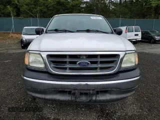 2003 Ford F-150 XL with VIN 1FTRX17L93NB69644, listed as a Copart auction lot 57130275 with 191,302 mi miles and Salvage title. Bid and sale history available at DreamBid. Image 5.