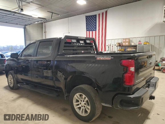 2023 Chevrolet Silverado 1500 LT Trail Boss with VIN 3GCPDFEK9PG271984, listed as a Copart auction lot 81034764 with 33,152 mi miles and Salvage Title. Bid and sale history available at DreamBid. Image 2.